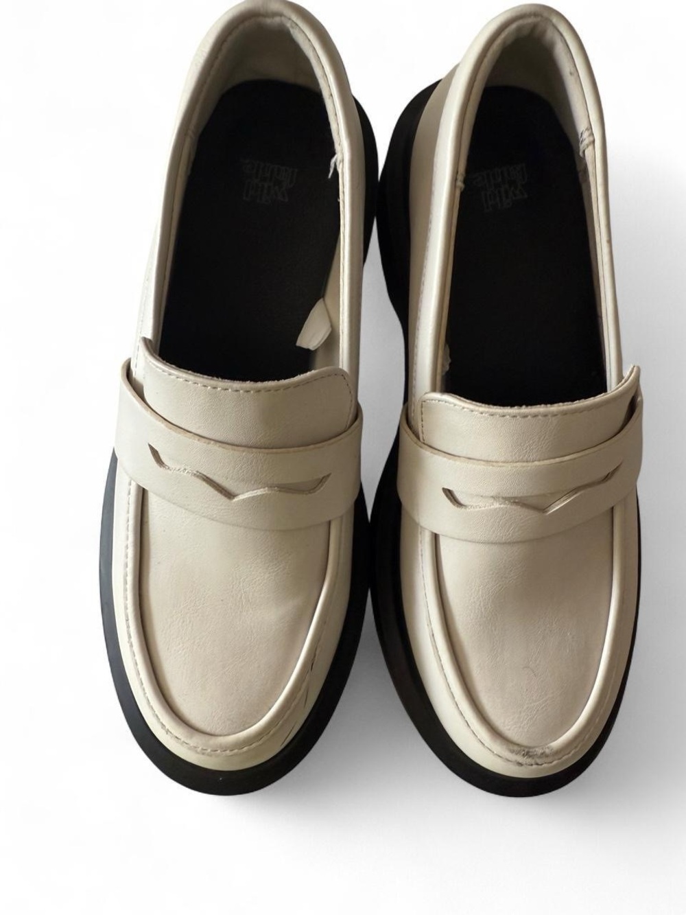 Wild Pair Cream Loafers with Black Sole